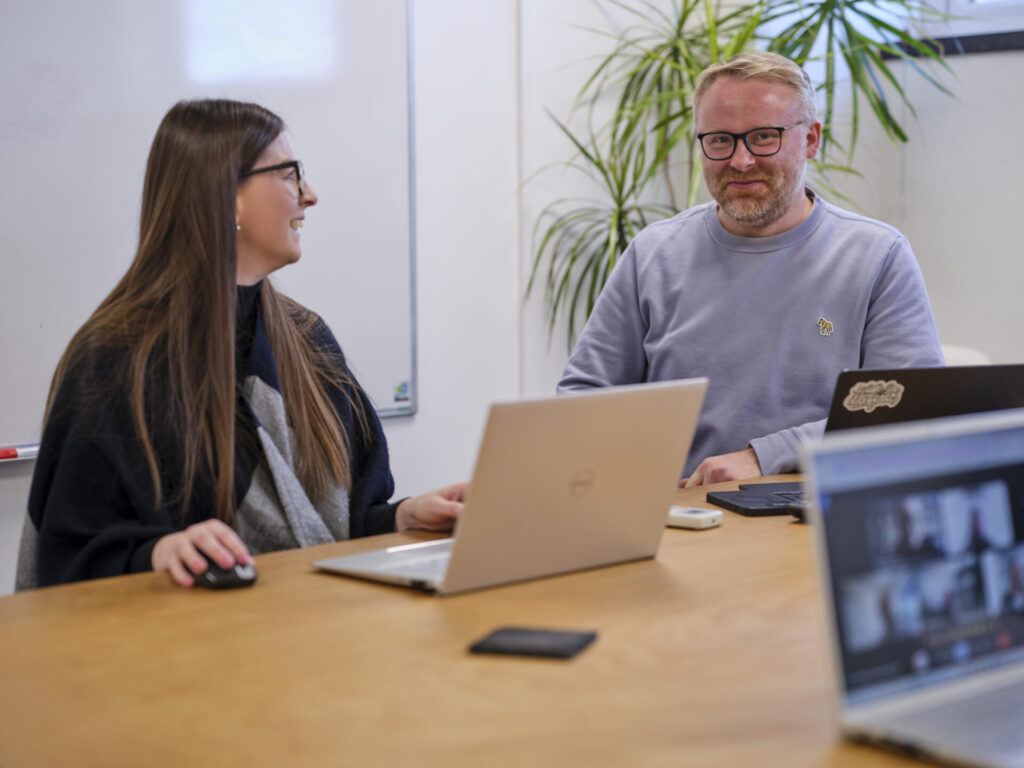 Charlotte Breed and Sam in Meeting Room 1 - Footprint digital office - full colour