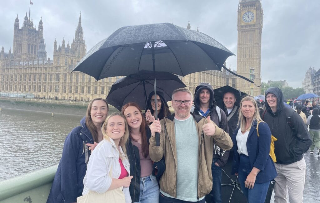 full colour Team outside Houses of Parliament