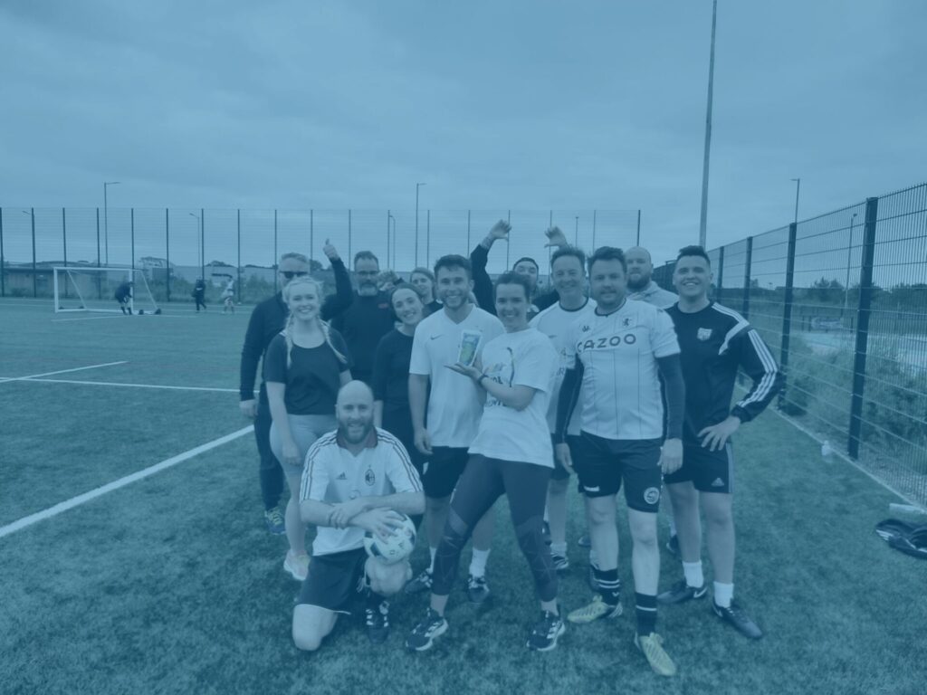 Blue team group photo football pitch