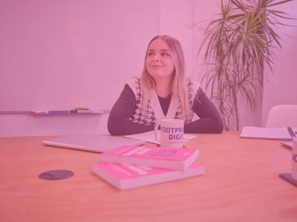 Klaudia in main meeting room pink image overlay