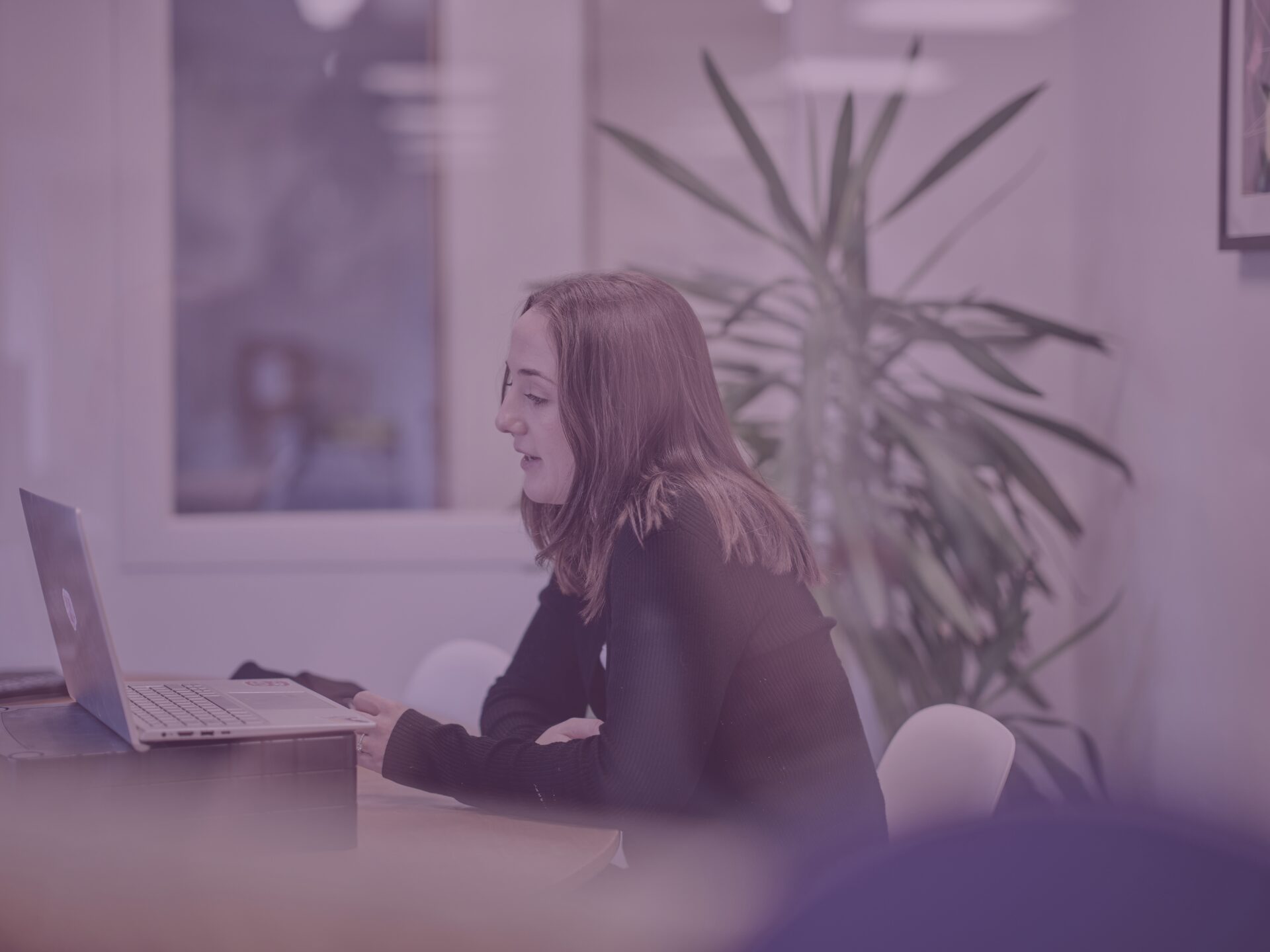 Rosie in office meeting room on call purple image overlay