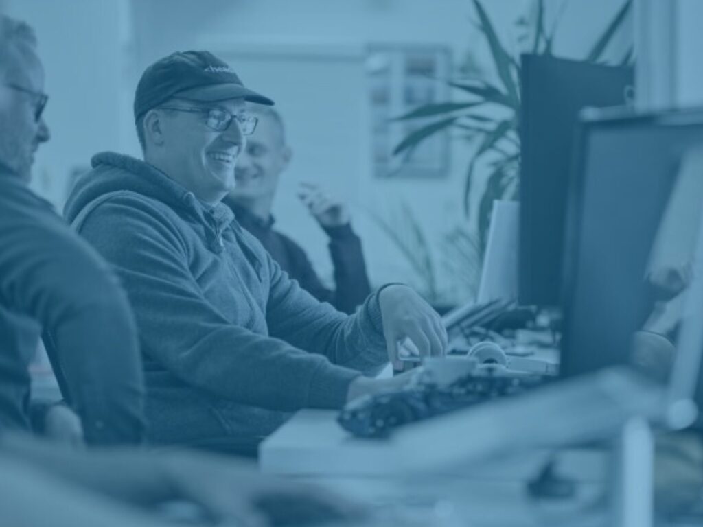 Jon and Rob in office blue image overlay