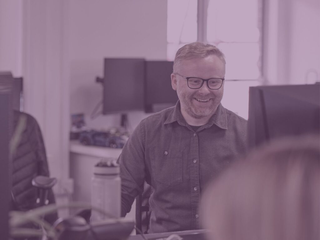 Sam in office purple image overlay