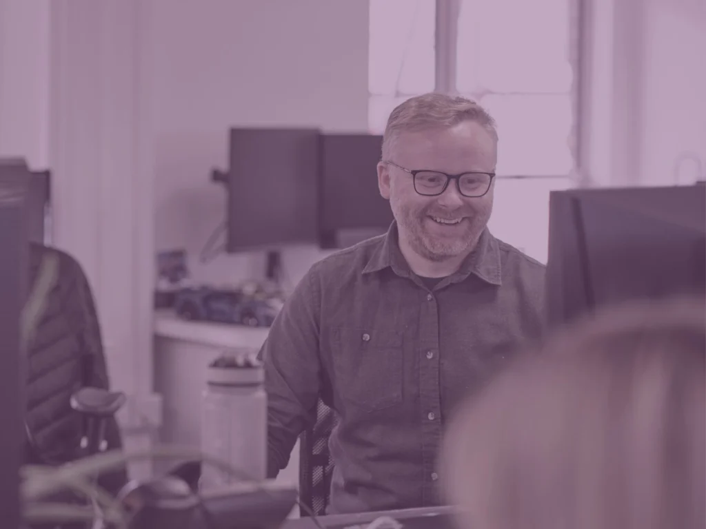 Sam in office purple image overlay